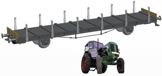 Flat car without brakes loaded with tracktor type S<br /><a href='images/pictures/Fleischmann/523602.jpg' target='_blank'>Full size image</a>